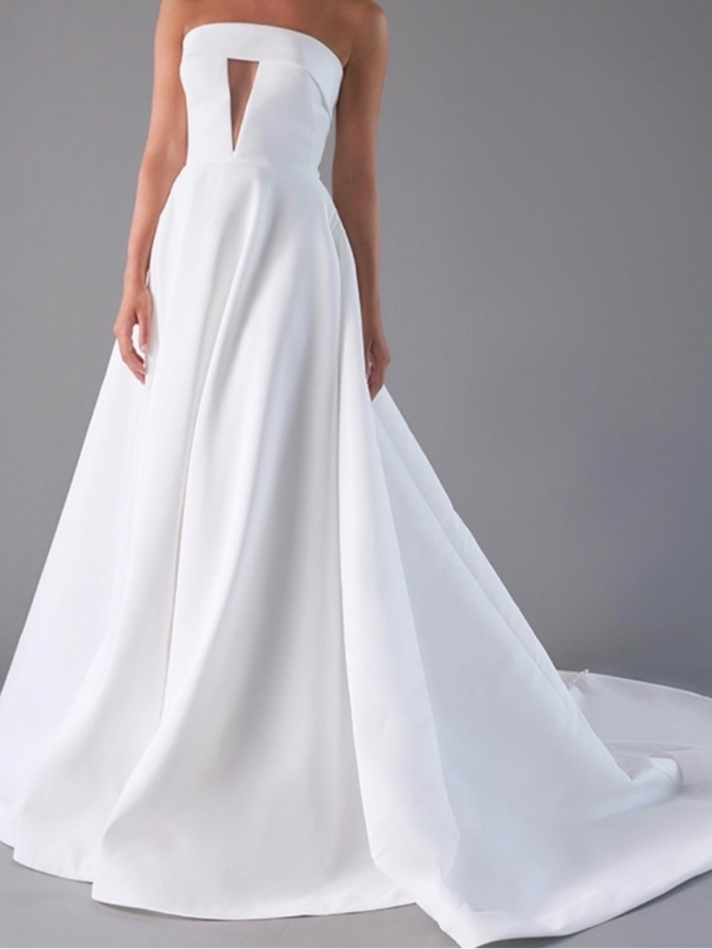 Elegant Strapless White Bridal Gown with Front Cutout